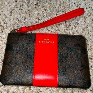 Coach Corner Zip Wristlet In Signature Canvas